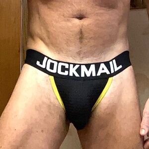 Jockmail , jockstrap, black and yellow, tag is Large but fits like medium.